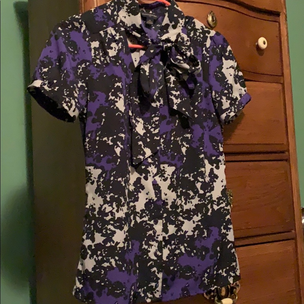 Dressy short sleeve, tie at neck top.